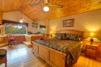 Master Bedroom of this 2 bedroom Pigeon Forge Cabin that sleeps 6